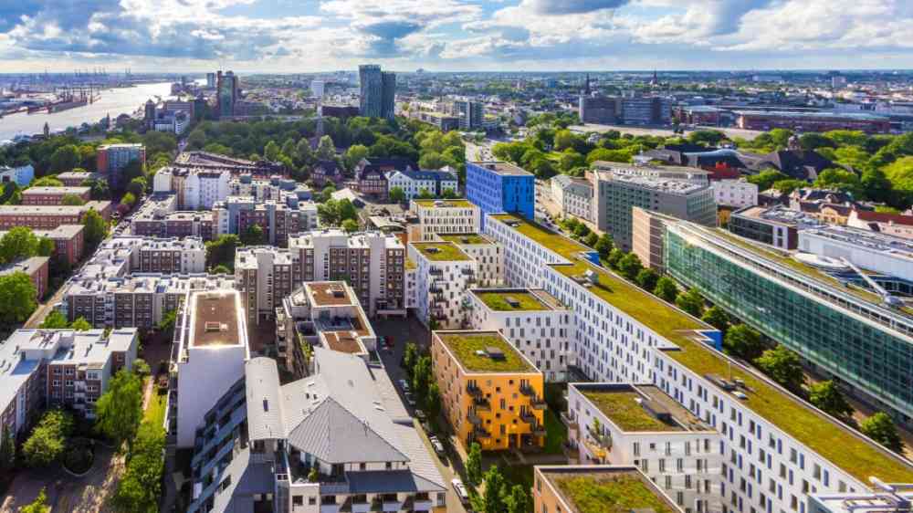 Urban policymakers reviewing heat adaptation strategies based on climate research
